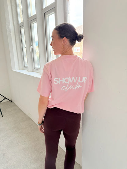 Person wearing a pink &